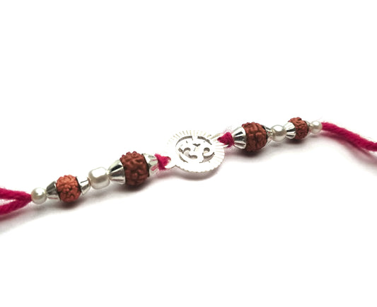 Traditional Silver Rakhi with Round Om - White background