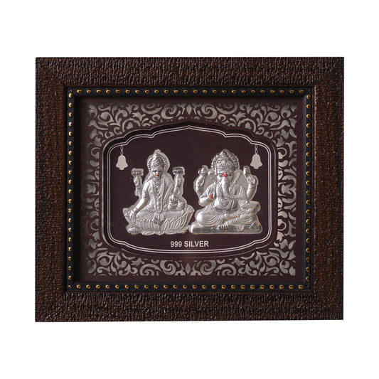 "Front view of exquisite 7.5x6.5 inch 999 pure silver Ganesh Laxmi frame by Hem Jewels®."	