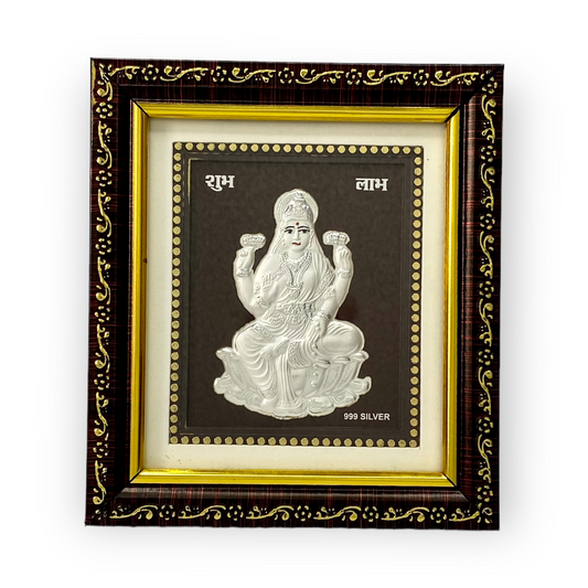 "Front view of exquisite 5x6 inch 999 pure silver Laxmi frame by Hem Jewels®."
