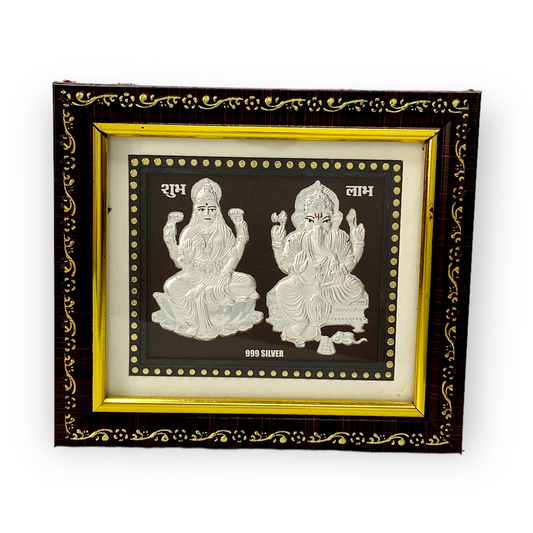 "Front view of exquisite 5x6 inch 999 pure silver Ganesh Laxmi frame by Hem Jewels®."