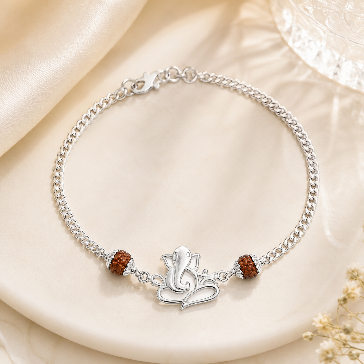 Pure Silver Rudraksha Rakhi for Brother with Chain | Design: Ganesh (RKH-RMR-43)