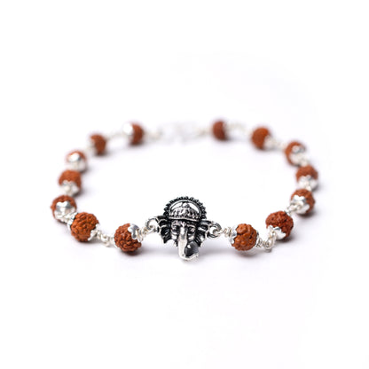Silver Rudraksha Rakhi with  Ganesh Face Motif - White background