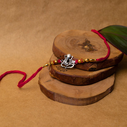 View showing Traditional Silver Rakhii with Cute Ganesha Motif